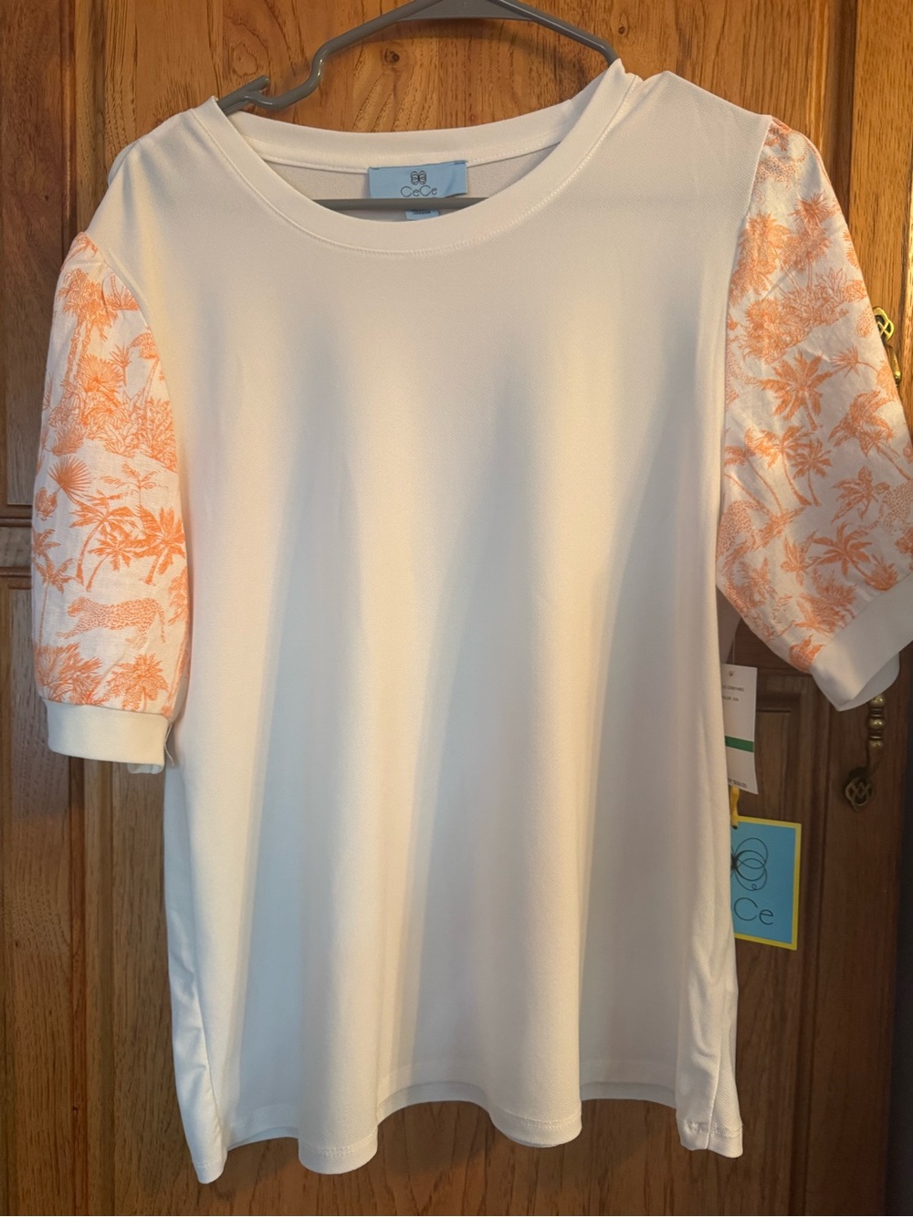 CeCe White Crewneck Tee with Light Blue Brand Tag